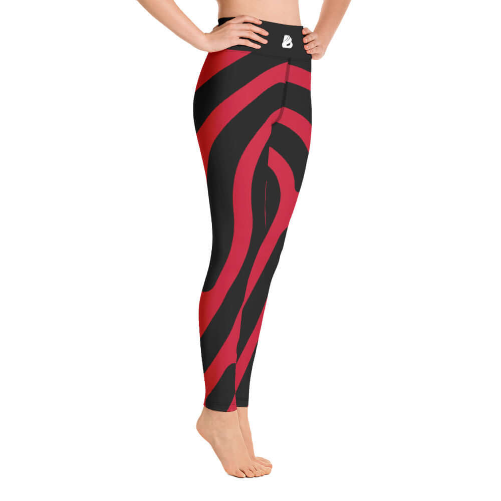 Person wearing Yoga-Leggings N°2, featuring red and black spiral design, super soft and stretchy fabric.