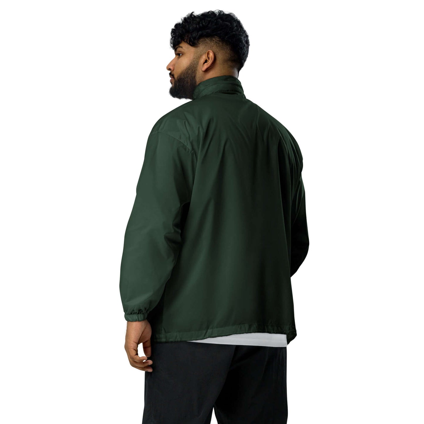 Back view of man wearing Basic-Unisex-Windbreaker N°0 in green, with elastic cuffs for a comfortable fit, lightweight and water-repellent.