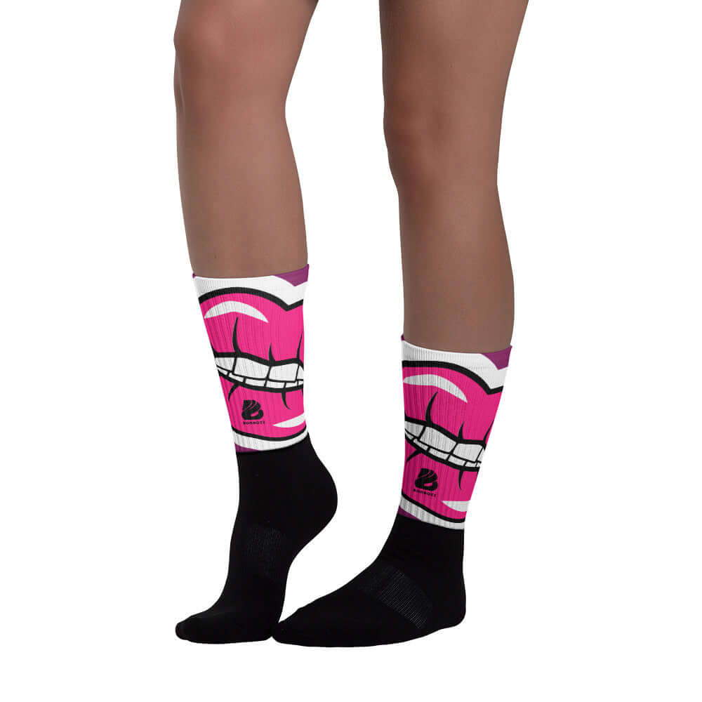 Colorful Socken N°1 with black foot and pink design, featuring a cushioned sole and ribbed leg for added comfort and style.