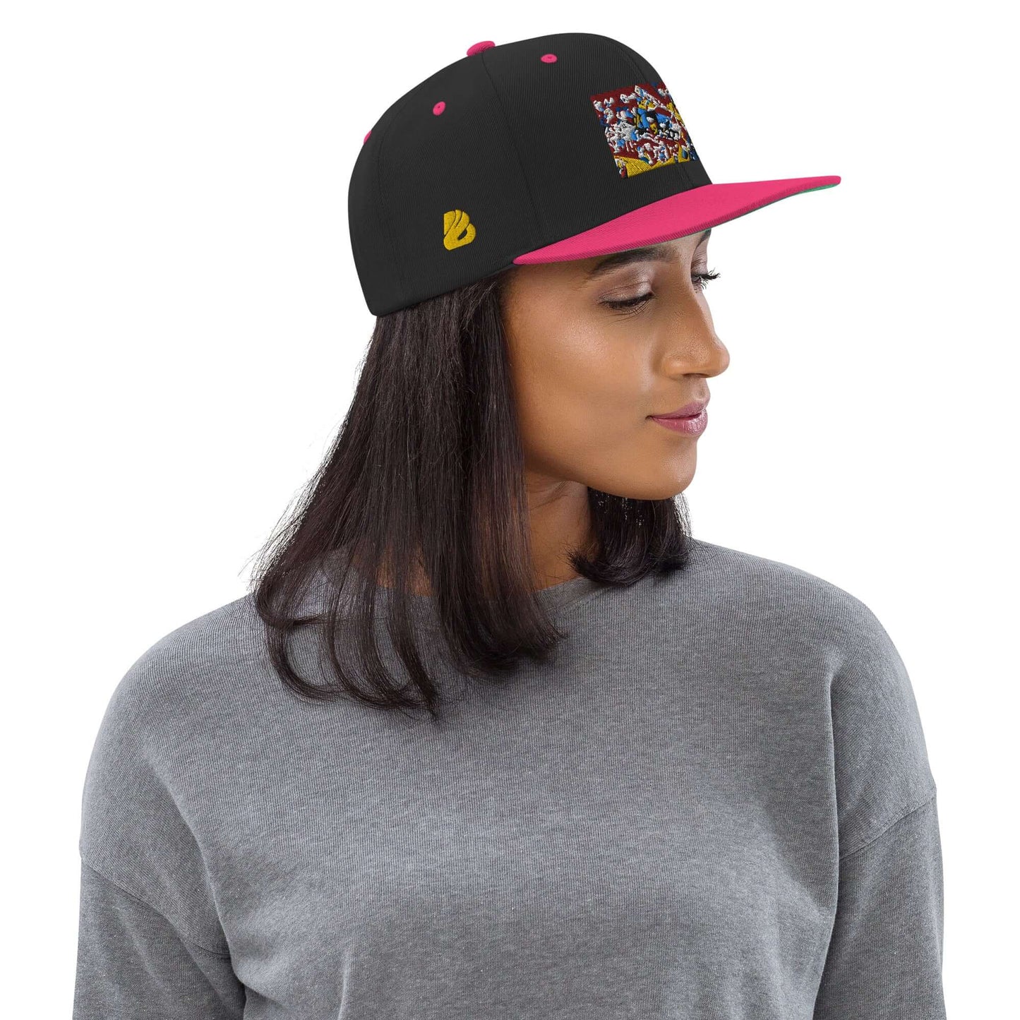Woman wearing Snapback-Cap N°4 with unique design and classic fit, featuring a flat brim and adjustable snap closure.