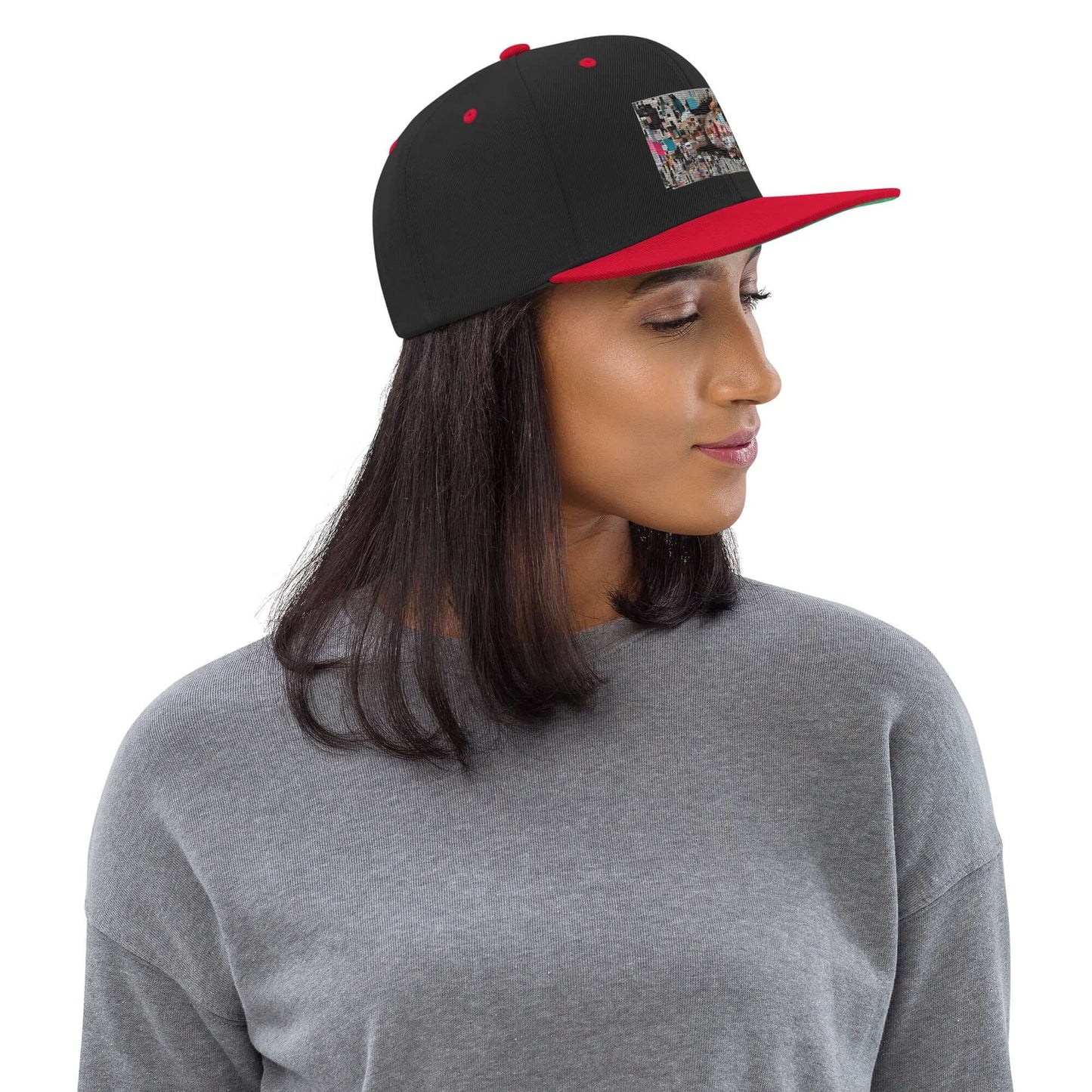 Woman wearing Snapback-Cap N°6 with classic fit, flat visor, red brim, and adjustable closure, perfect for casual style.