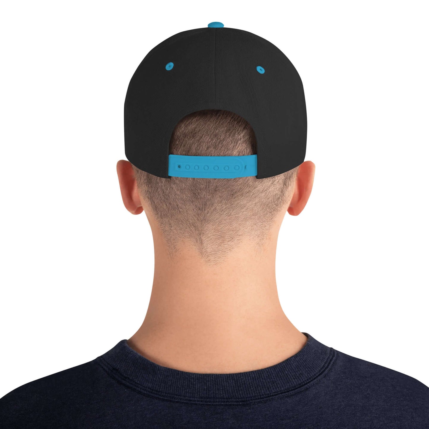 Back view of Snapback-Cap N°5 with adjustable snap closure, high-profile design, and six-panel structure.