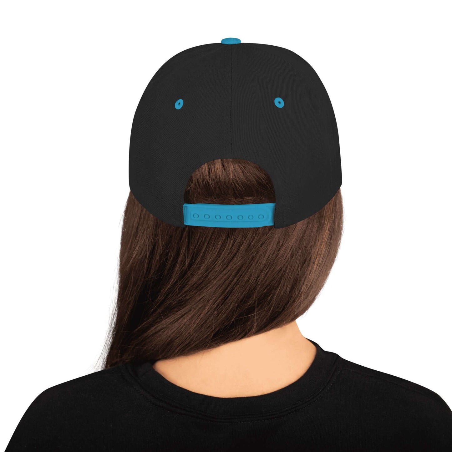 Back view of Snapback-Cap N°6 with adjustable snap closure, high-profile structure, seen on a person wearing it, showcasing classic design.