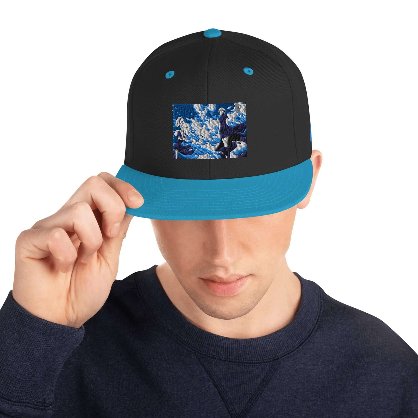 Snapback-Cap N°5 worn by model, black with blue visor and artistic design