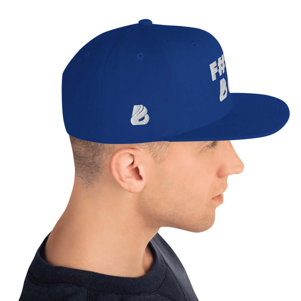 Snapback-Cap N°2 in blue with structured 6-panel design and adjustable snap closure, shown on a model's head for fit.