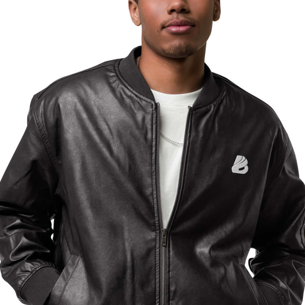 Man wearing Leder-Bomberjacke N°0 in black PU leather with rib-knit cuffs, perfect for casual, chic, or sporty outfits.