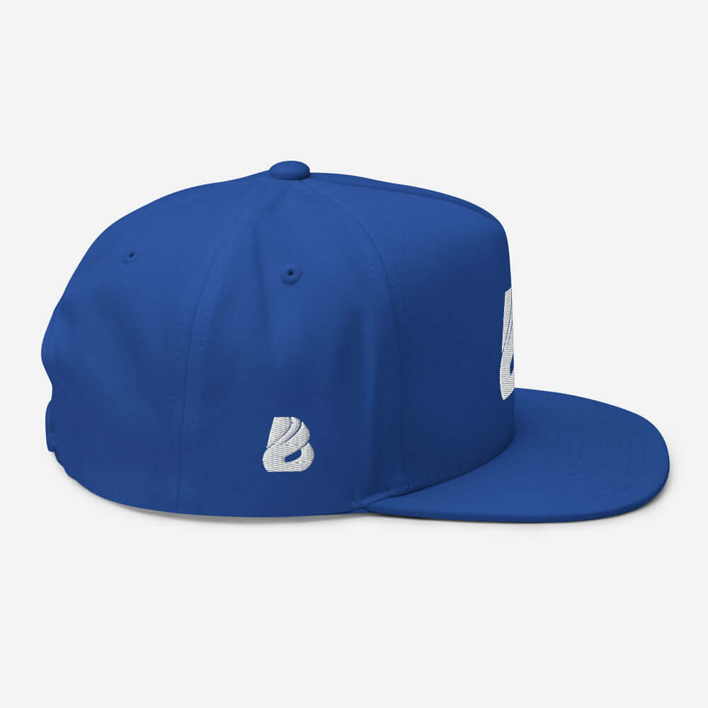 Blue Flat Bill-Cap N°0 with green under visor, structured 5-panel, high-profile design, made from 100% cotton corduroy with snapback closure.