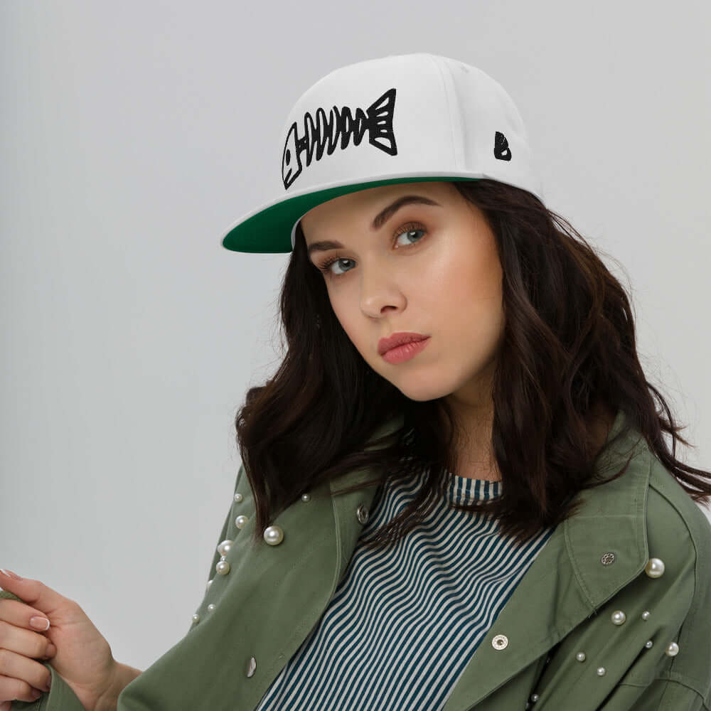 Flat Bill-Cap N°2 with green under visor worn by model, highlighting structured 5-panel design and snapback closure.
