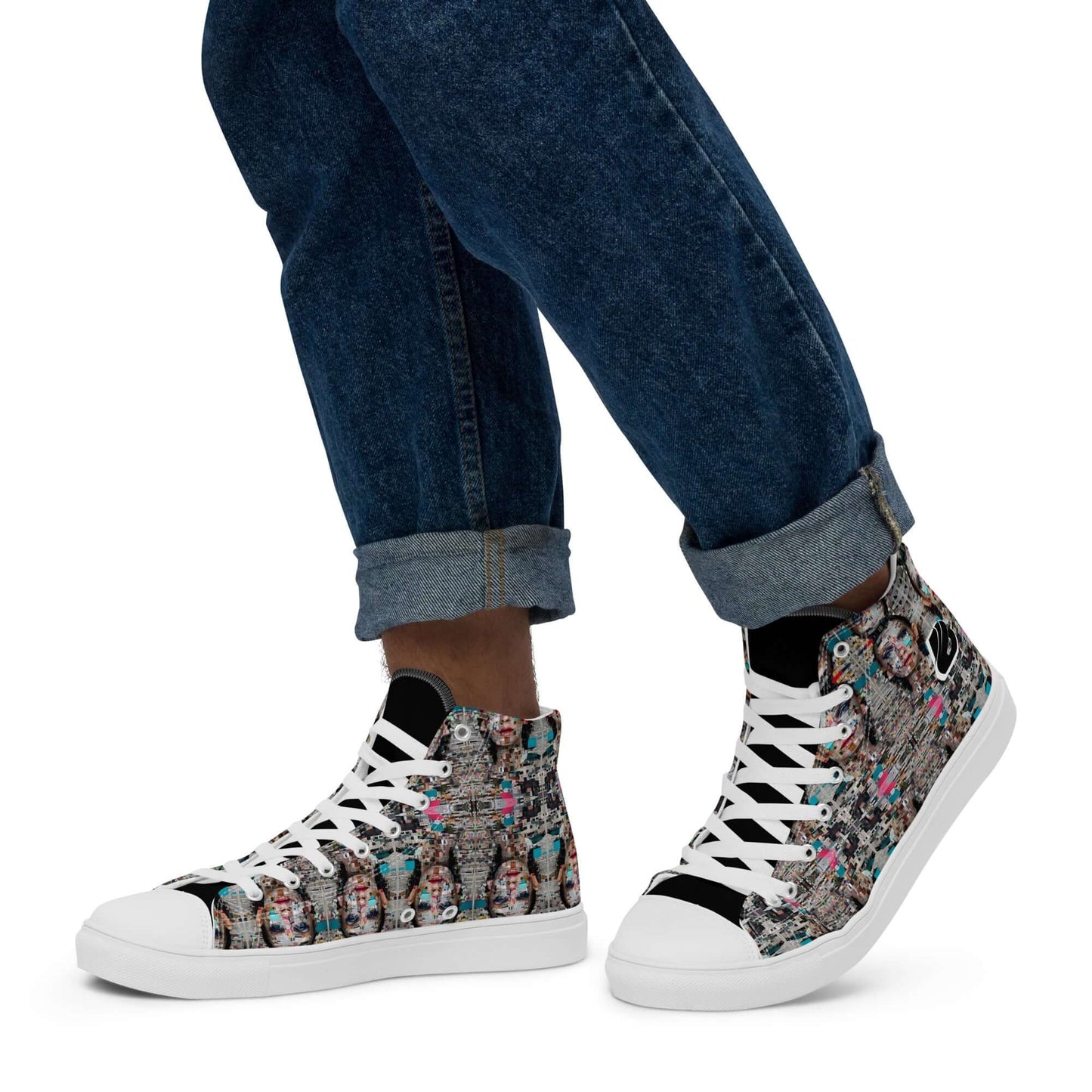 Person wearing trendy High-Top Leinenschuhe für Herren N°0 with colorful pattern and white laces, paired with rolled-up jeans.
