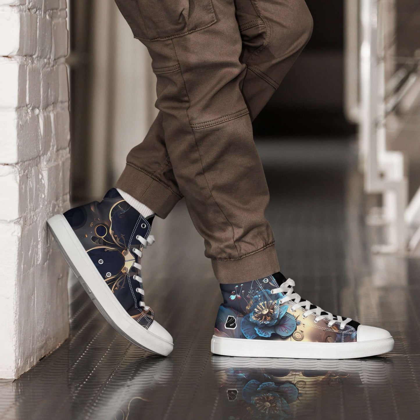Man wearing stylish High-Top Leinenschuhe für Herren N°2 with floral design, leaning against a brick wall.