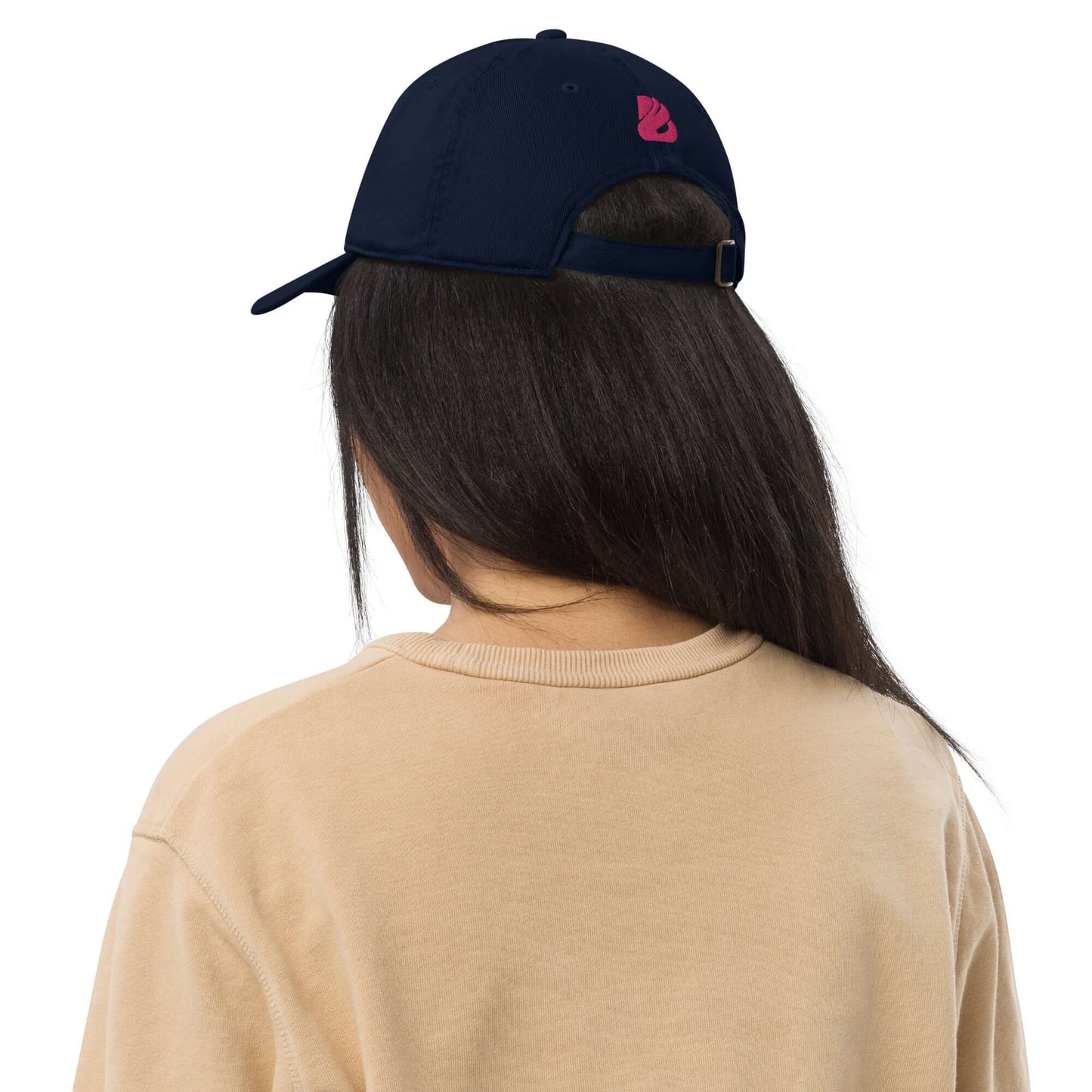 Person wearing Bio-Dad Hat N°0 made from 100% organic cotton, rear view showcasing sustainable fashion choice.