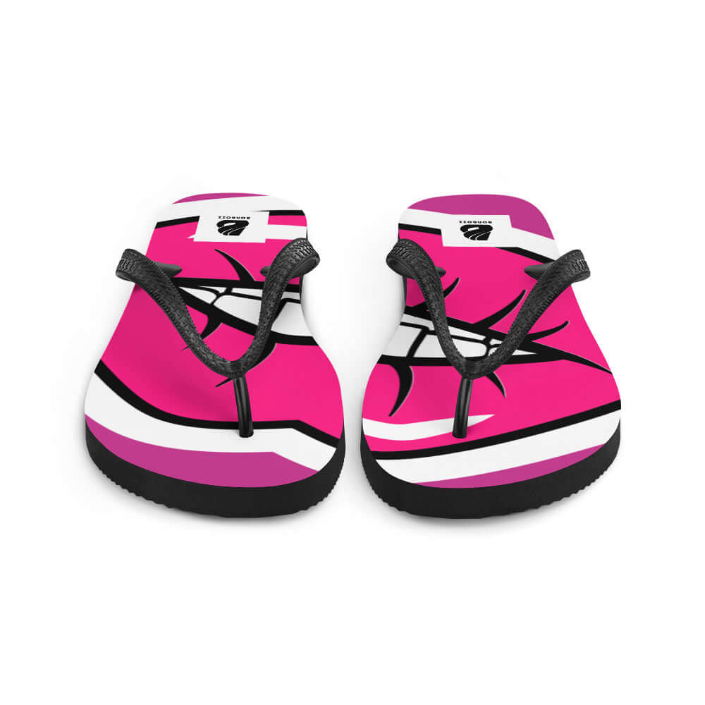 Bright pink Flip-Flops N°2 with black straps and abstract design, ideal for a comfortable and adventurous summer. Rubber sole with polyester lining.