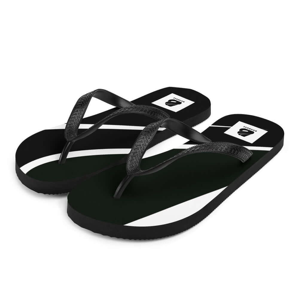 Stylish black and white Flip-Flops N°0 with a comfortable design, featuring a rubber sole and black Y-shaped straps.