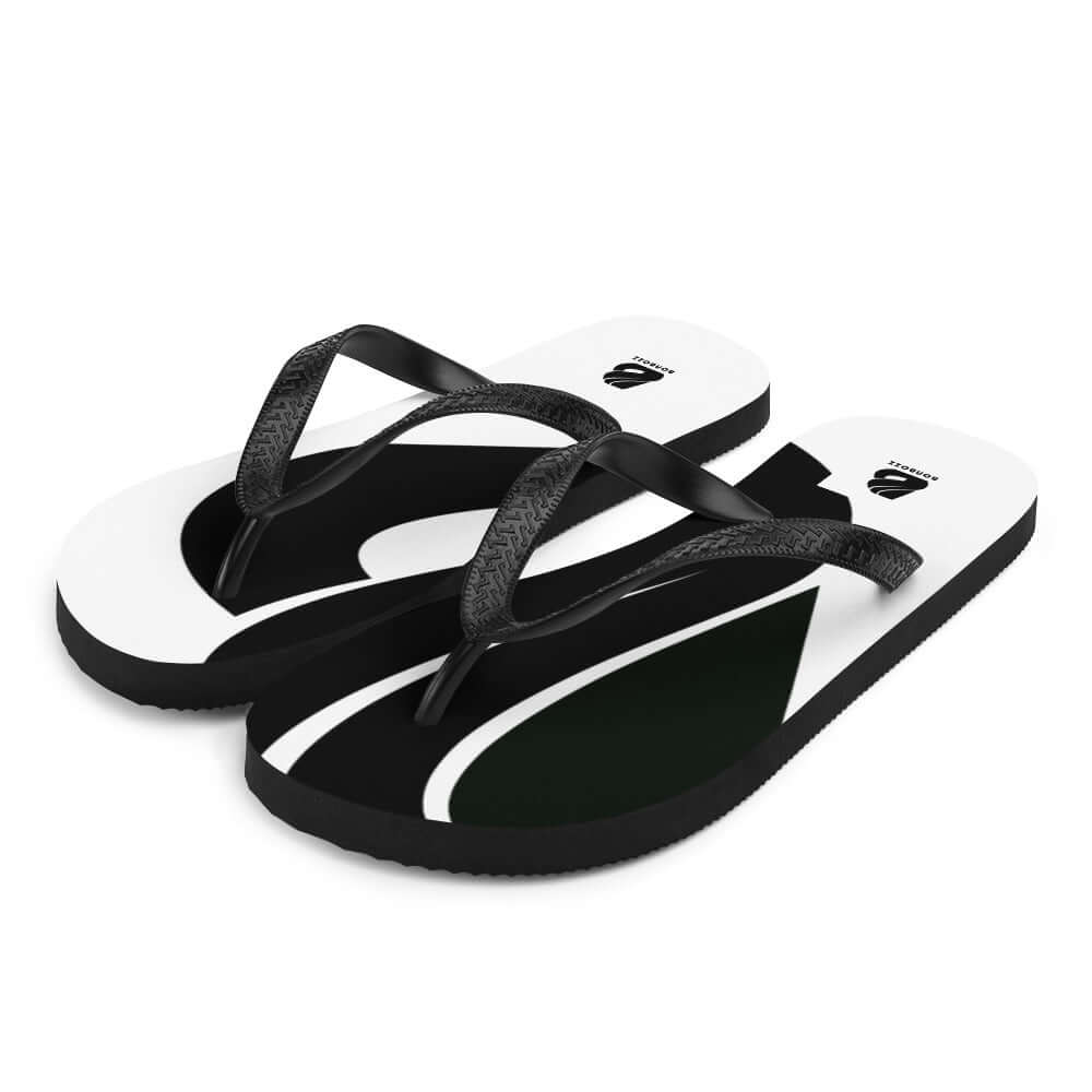 Flip-Flops N°4 with black and white design, featuring soft fabric-covered rubber sole for comfort.