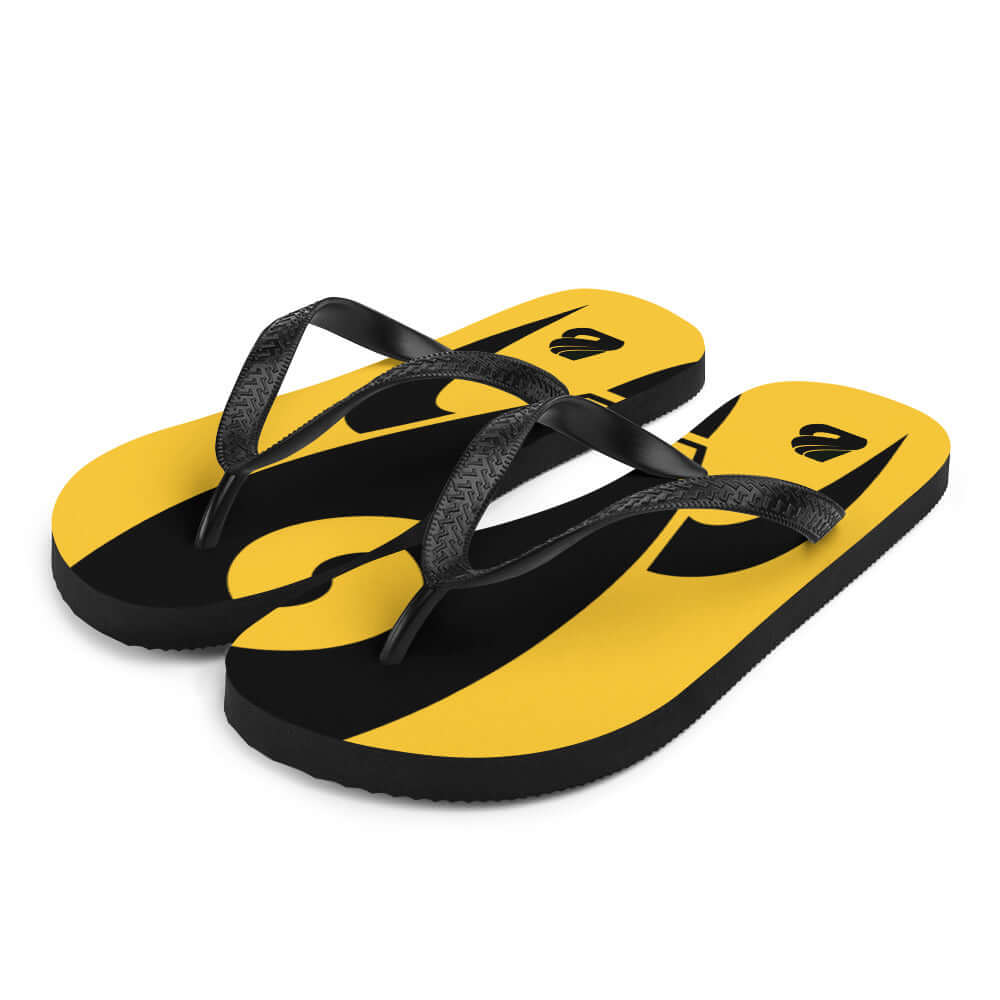 Flip-Flops N°6 in yellow and black, featuring a soft polyester printed cover, black Y-shaped rubber bands, and comfortable design.