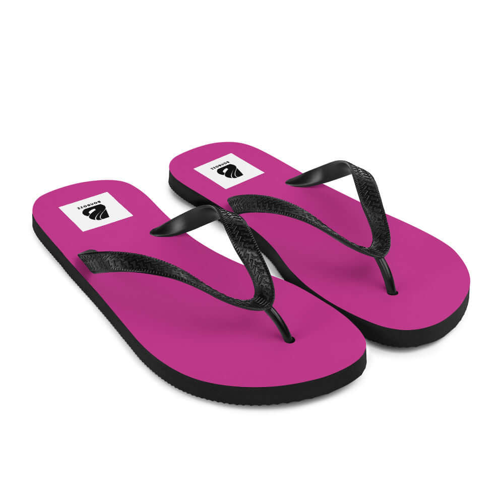 Pink Flip-Flops N°3 with black straps and logo, perfect for summer adventures, featuring a soft polyester-covered rubber sole.