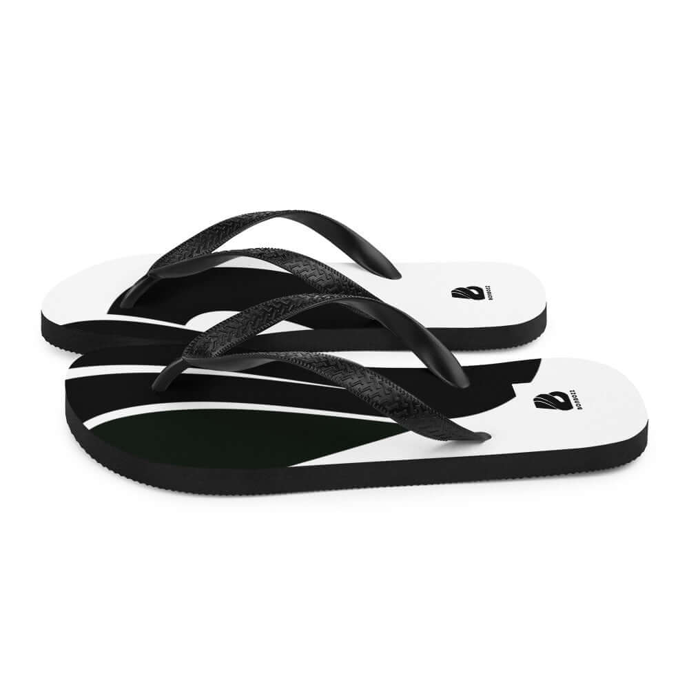 Flip-Flops N°4 with black and white design, featuring a comfortable rubber sole and Y-shaped straps for summer adventures.