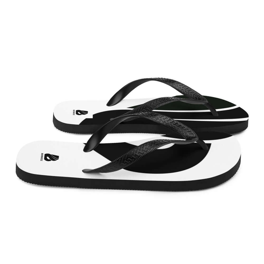 Flip-Flops N°4 with black straps and white sole, perfect for summer adventures and all-day comfort.