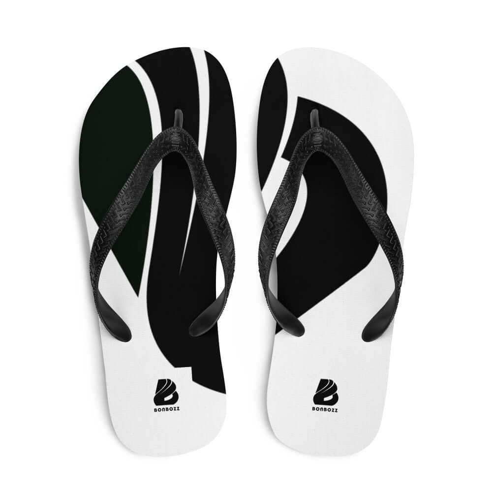 Flip-Flops N°4 with black and white abstract design, featuring soft fabric-covered rubber soles and black Y-shaped straps for comfort.