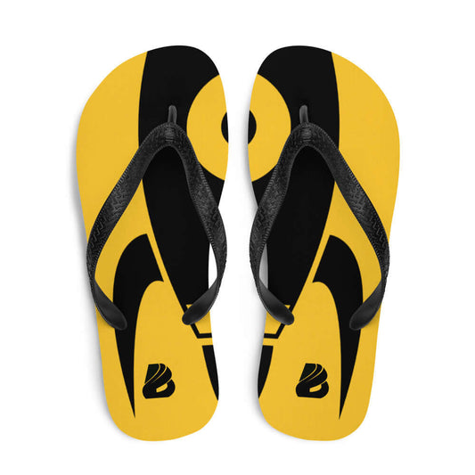 Yellow and black Flip-Flops N°6 with soft fabric-covered rubber sole and black Y-shaped straps, perfect for summer adventures.