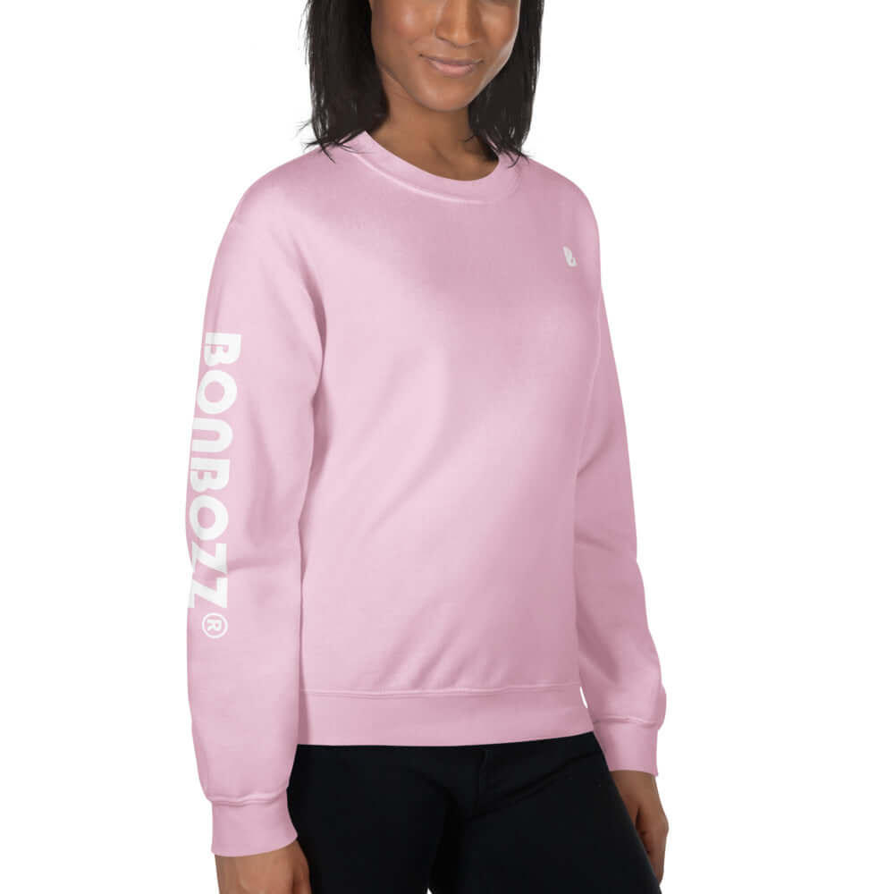 Unisex-Pullover N°13 in pink, strapazierfähig und warm, klassische Passform, sportlicher 1x1 gerippter Kragen, aus Baumwolle und Polyester.