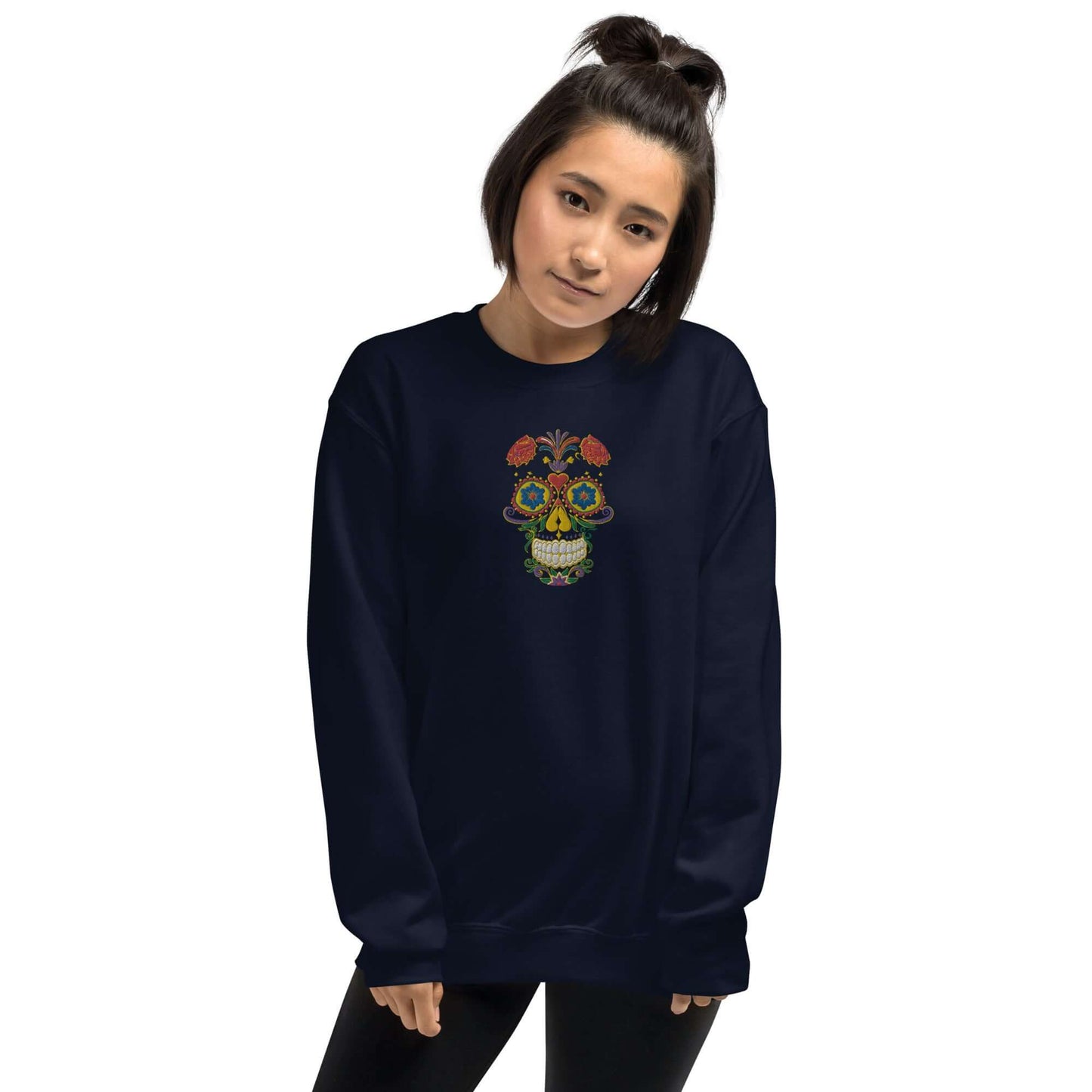 Unisex-Pullover N°27 with colorful skull design, worn by person, in dark color. Perfect for staying warm and stylish in cold months.