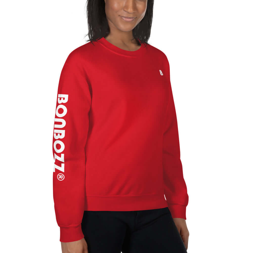 Unisex-Pullover N°13 in red, featuring ribbed cuffs and breathable fabric, worn by a model, offering warmth and durability.
