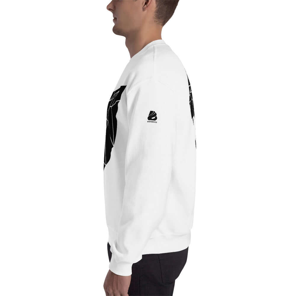 Side view of a model wearing a white Unisex-Pullover N°0 made from a 50% cotton, 50% polyester blend, showcasing the classic fit.