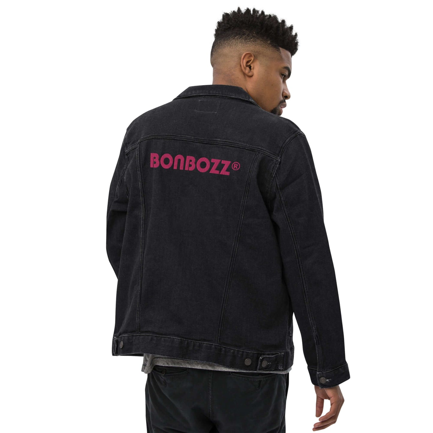 Person wearing Unisex Jeansjacke N°0 in black with BONBOZZ logo on the back.