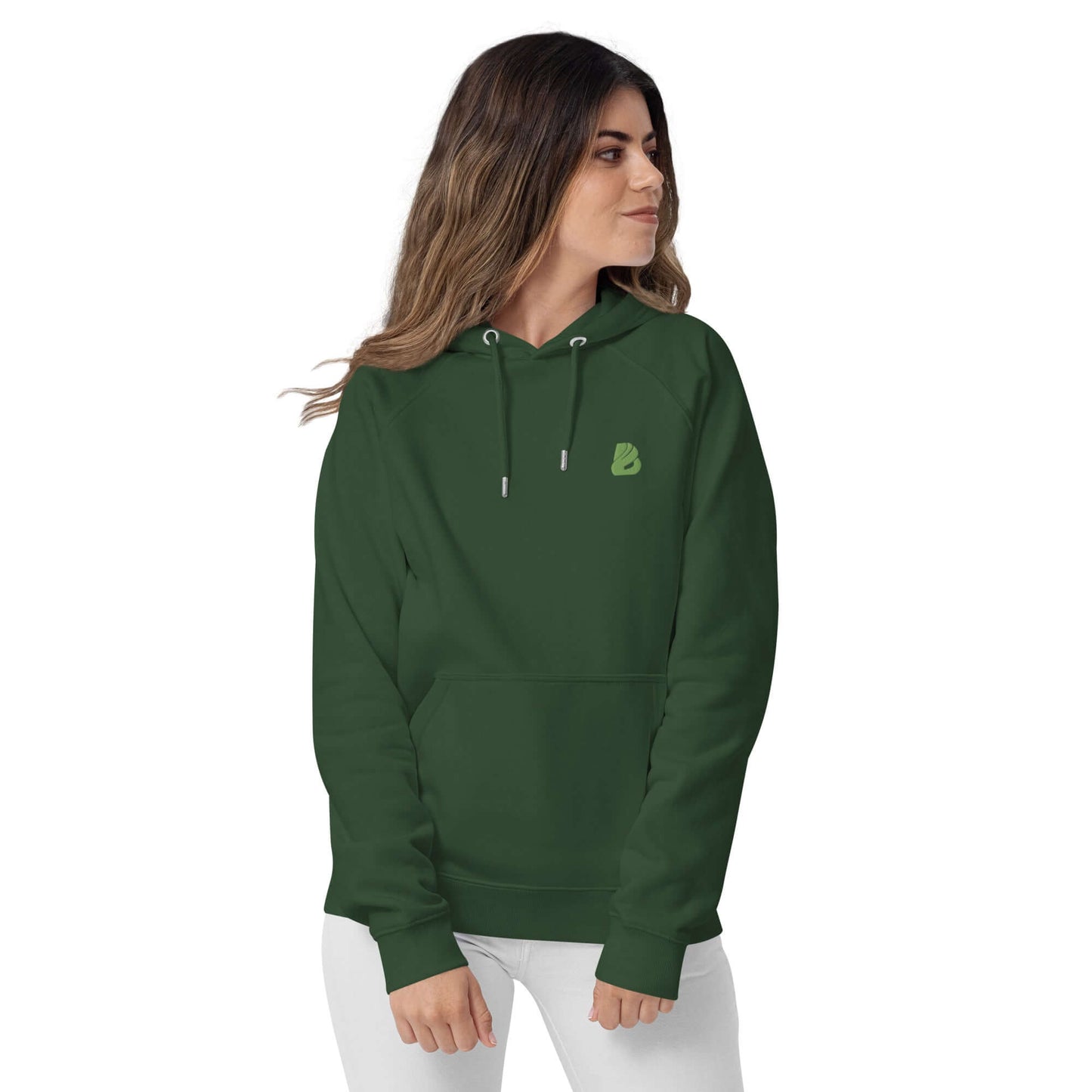 Model wearing Unisex Bio-Raglan-Hoodie N°0 in dark green, showcasing front pocket and hood.