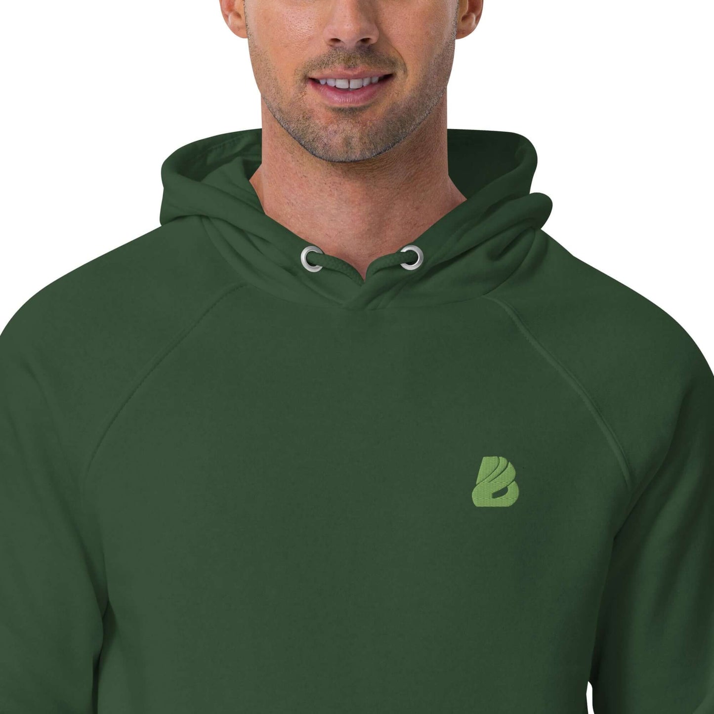 Model wearing Unisex Bio-Raglan-Hoodie N°0 in forest green color