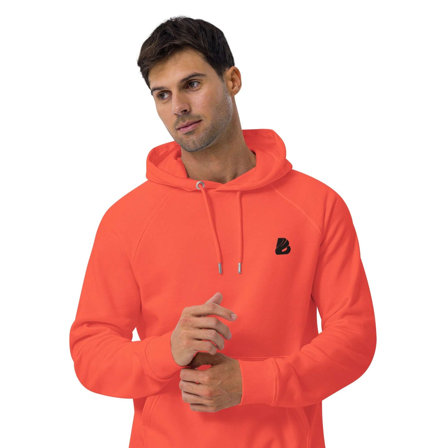 Man wearing Unisex Bio-Raglan-Hoodie N°1 in bright orange