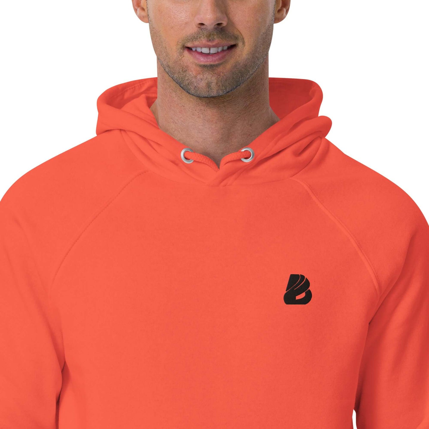 Close-up of man wearing an orange Unisex Bio-Raglan-Hoodie N°1 with logo on the chest.