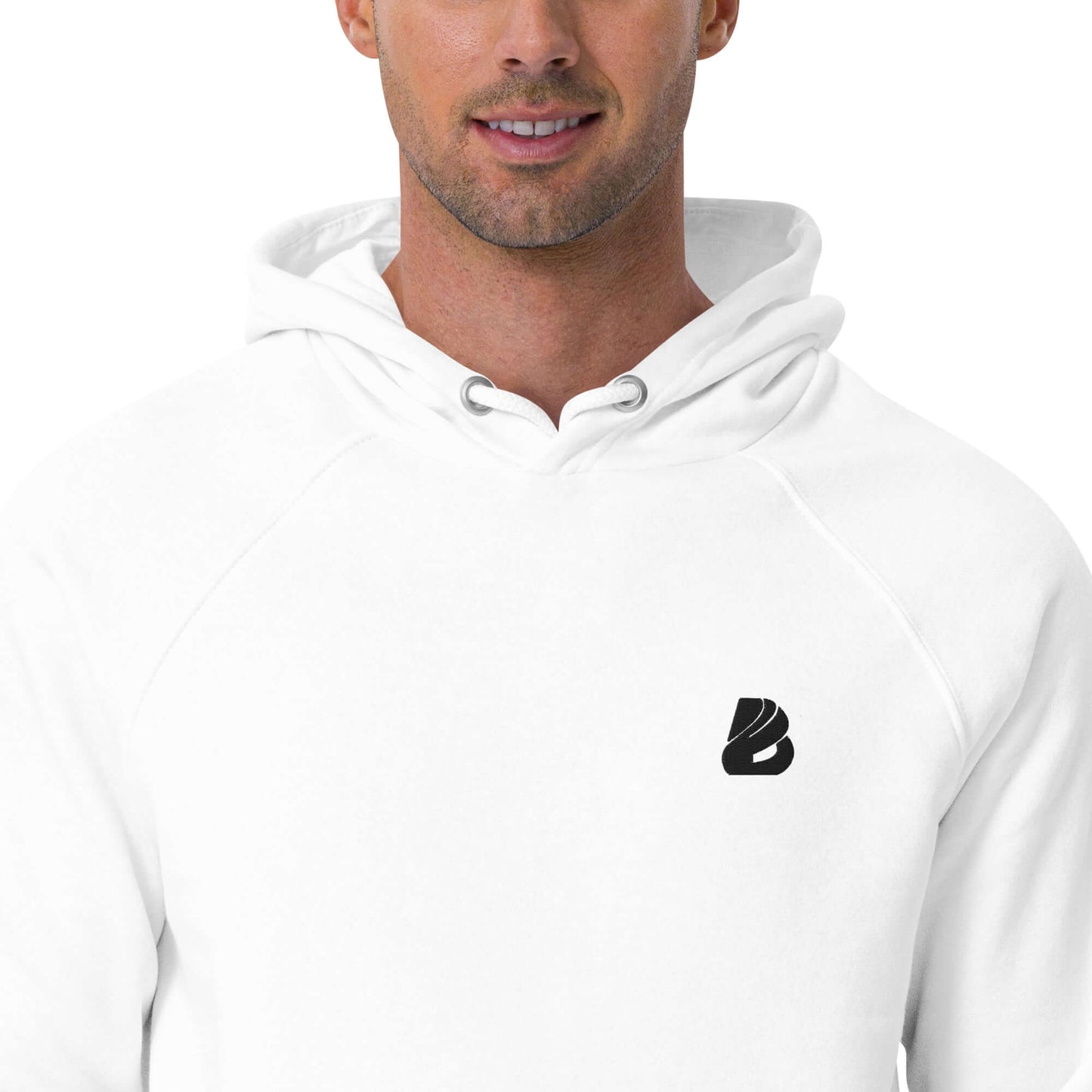 Model wearing white Unisex Bio-Raglan-Hoodie N°1 with black logo, showcasing its soft texture and stylish design.