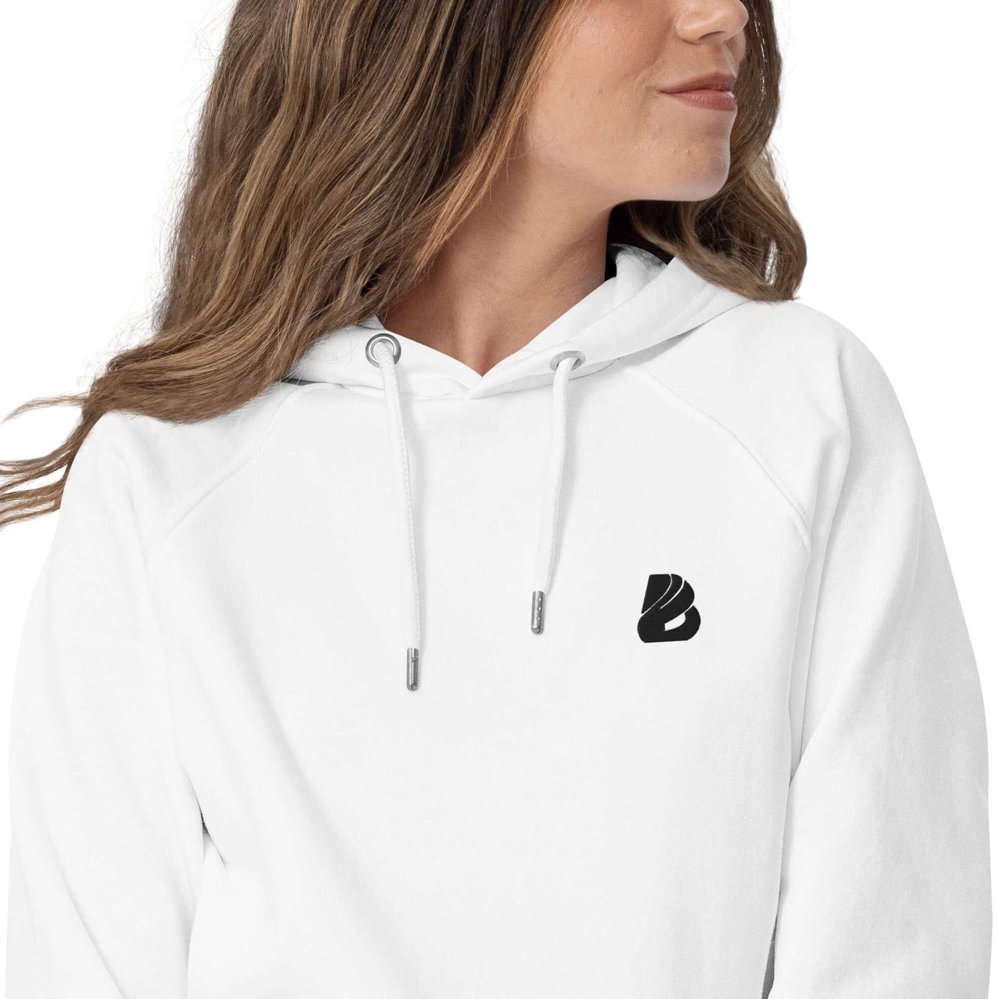 Woman wearing Unisex Bio-Raglan-Hoodie N°1 in white, featuring a soft interior and stylish design.