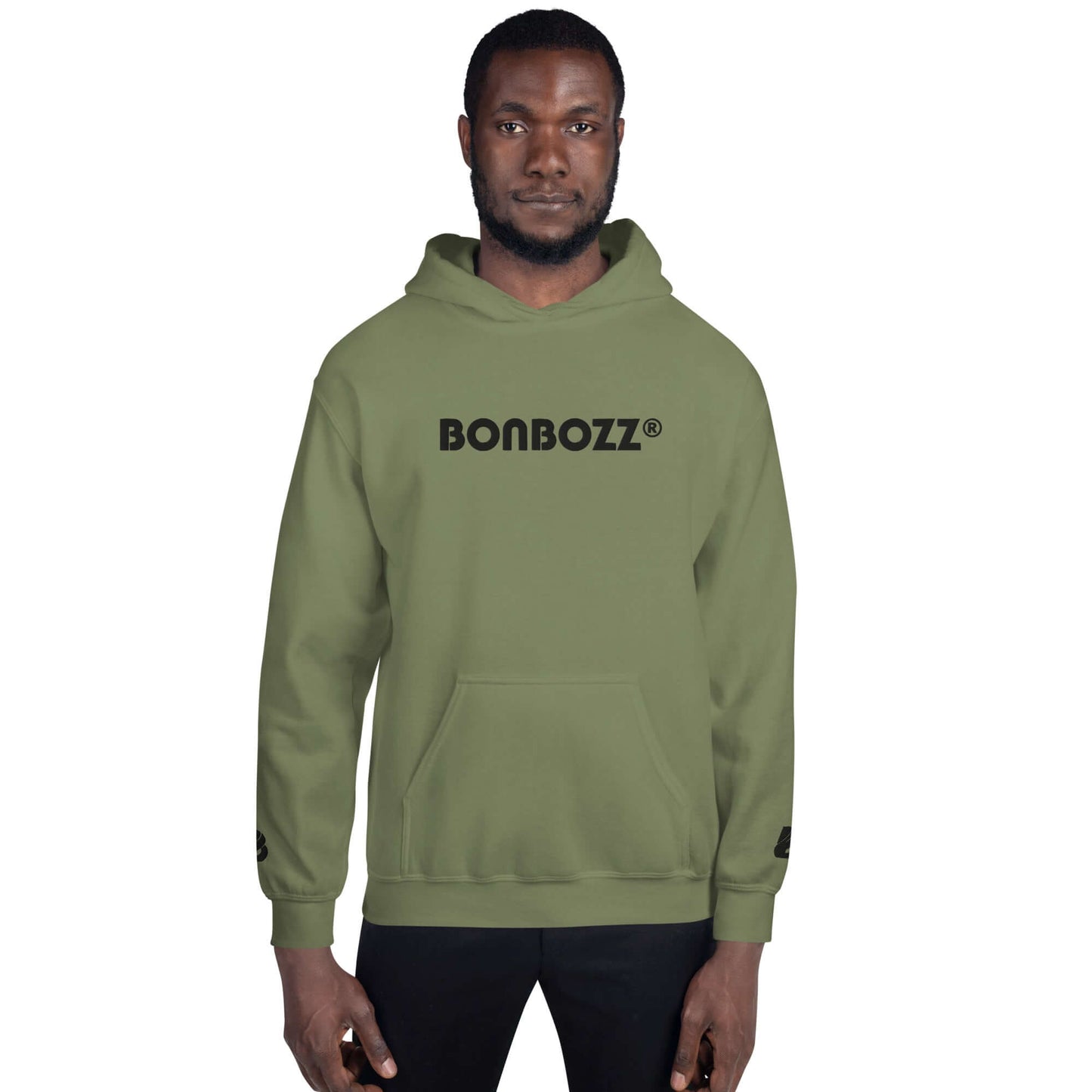 Model wearing Unisex-Kapuzenpullover N°46 in olive, showing stylish and comfortable design perfect for cool evenings.
