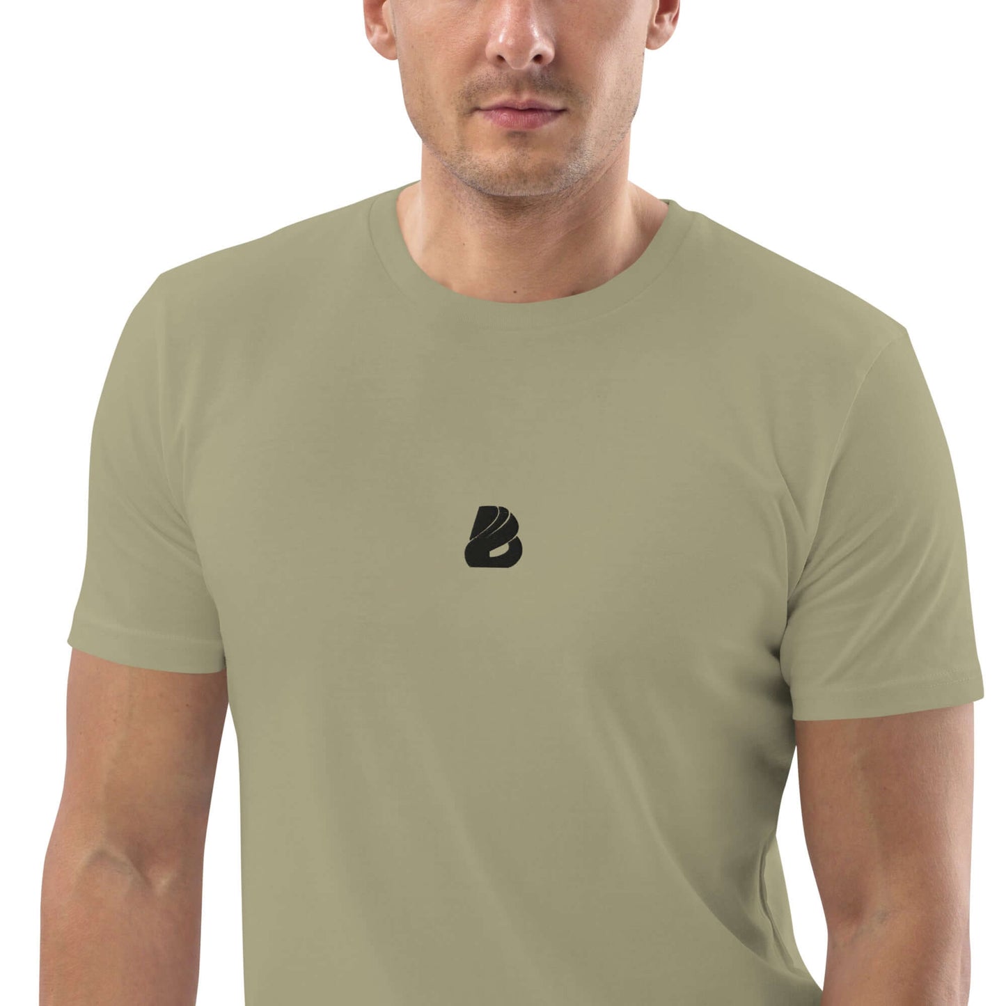 Person wearing Unisex-Bio-Baumwoll-T-Shirt N°0 made from 100% organic cotton, featuring a minimalist logo on the chest.