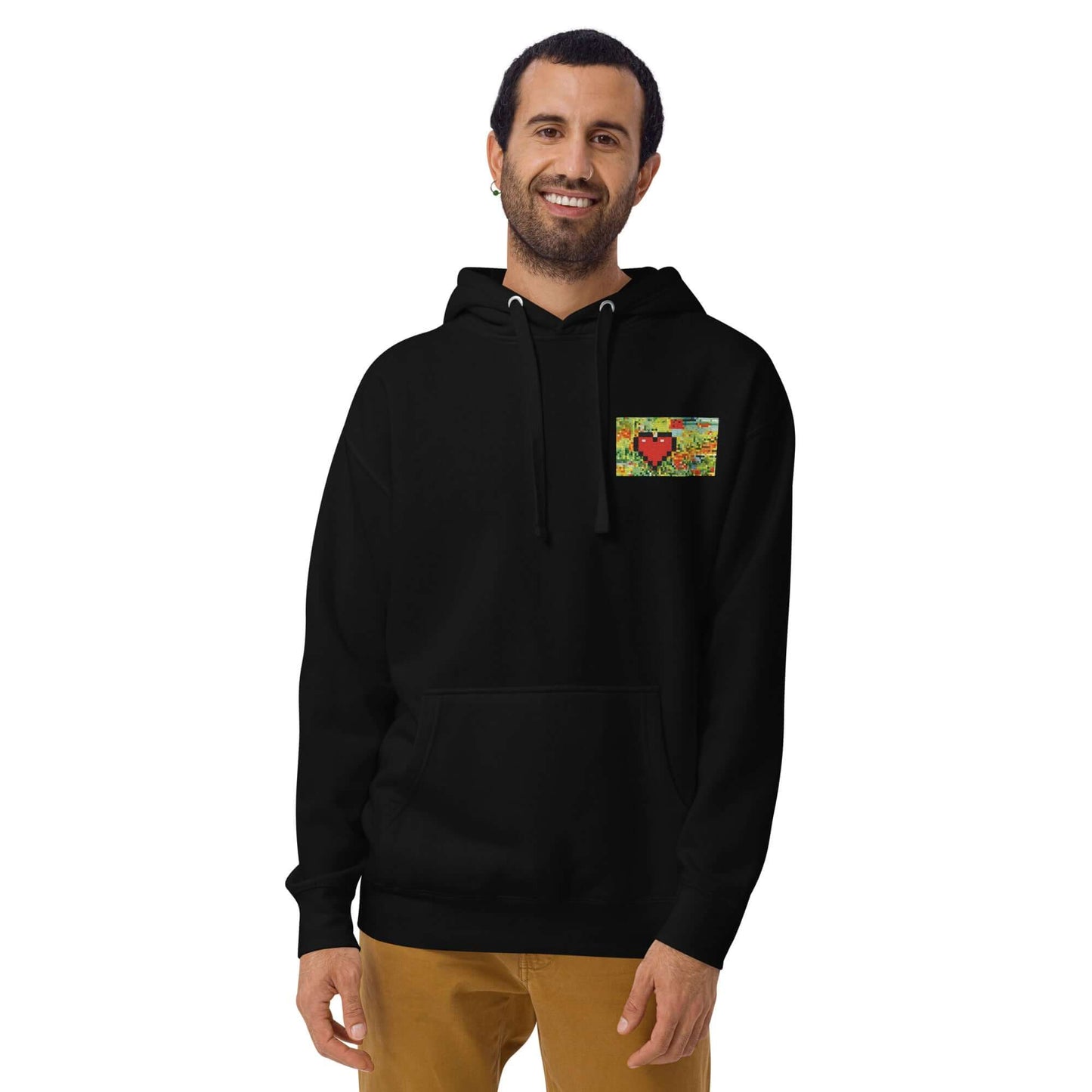 Unisex-Kapuzenpullover N°45 in black with colorful patch, featuring kangaroo pocket and hood, worn by model