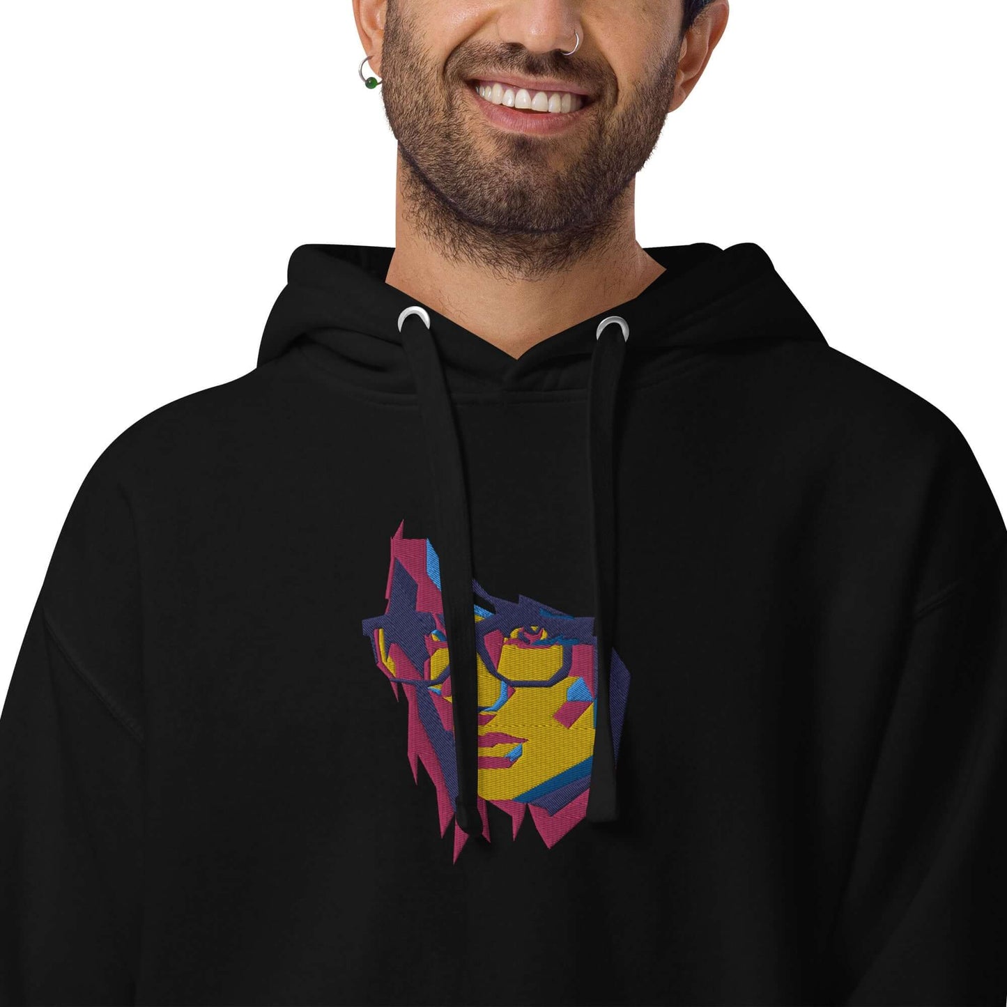 Unisex-Kapuzenpullover N°39 featuring a colorful face design on a black hoodie with comfortable kangaroo pocket and matching drawstrings.
