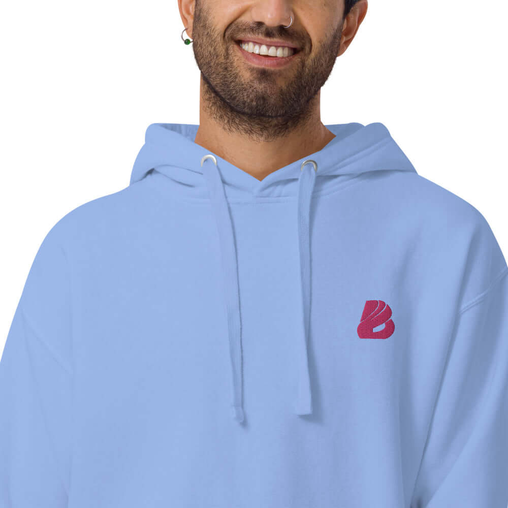 Unisex-Kapuzenpullover N°22 featuring soft cotton blend, kangaroo pocket, and hood in light blue with red emblem on front