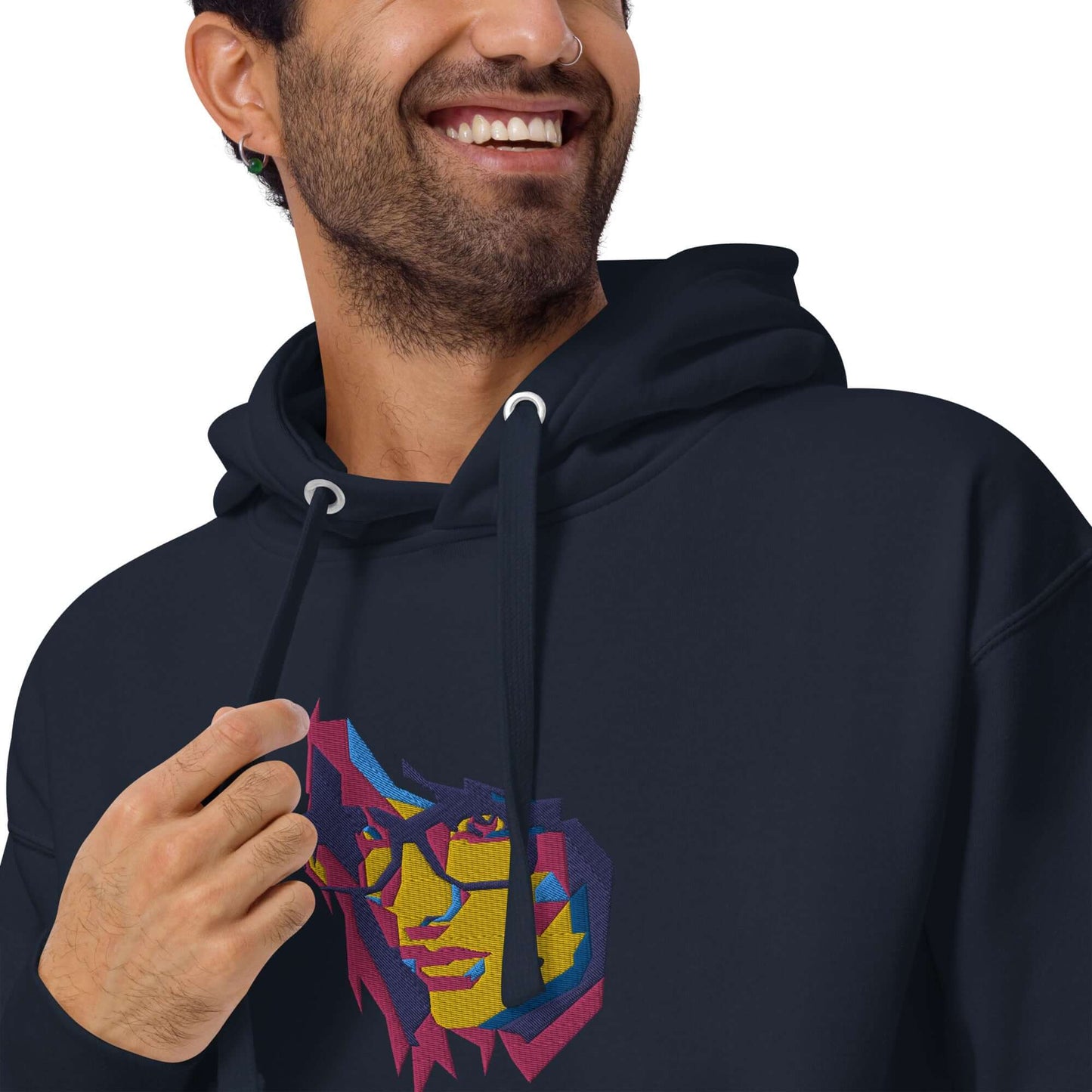 Man wearing Unisex-Kapuzenpullover N°39 with colorful graphic, featuring kangaroo pocket and hood for cool evenings' comfort.