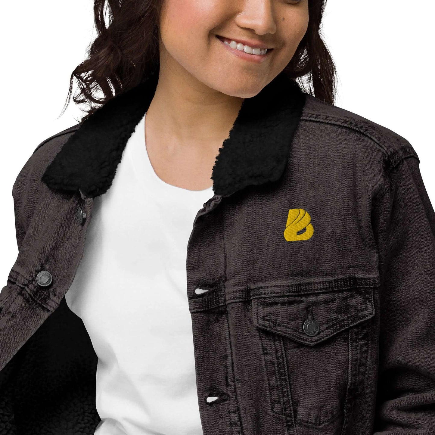 Person wearing Unisex Sherpa Jeansjacke N°0 with warm Sherpa lining, showcasing stylish denim with recycled materials.
