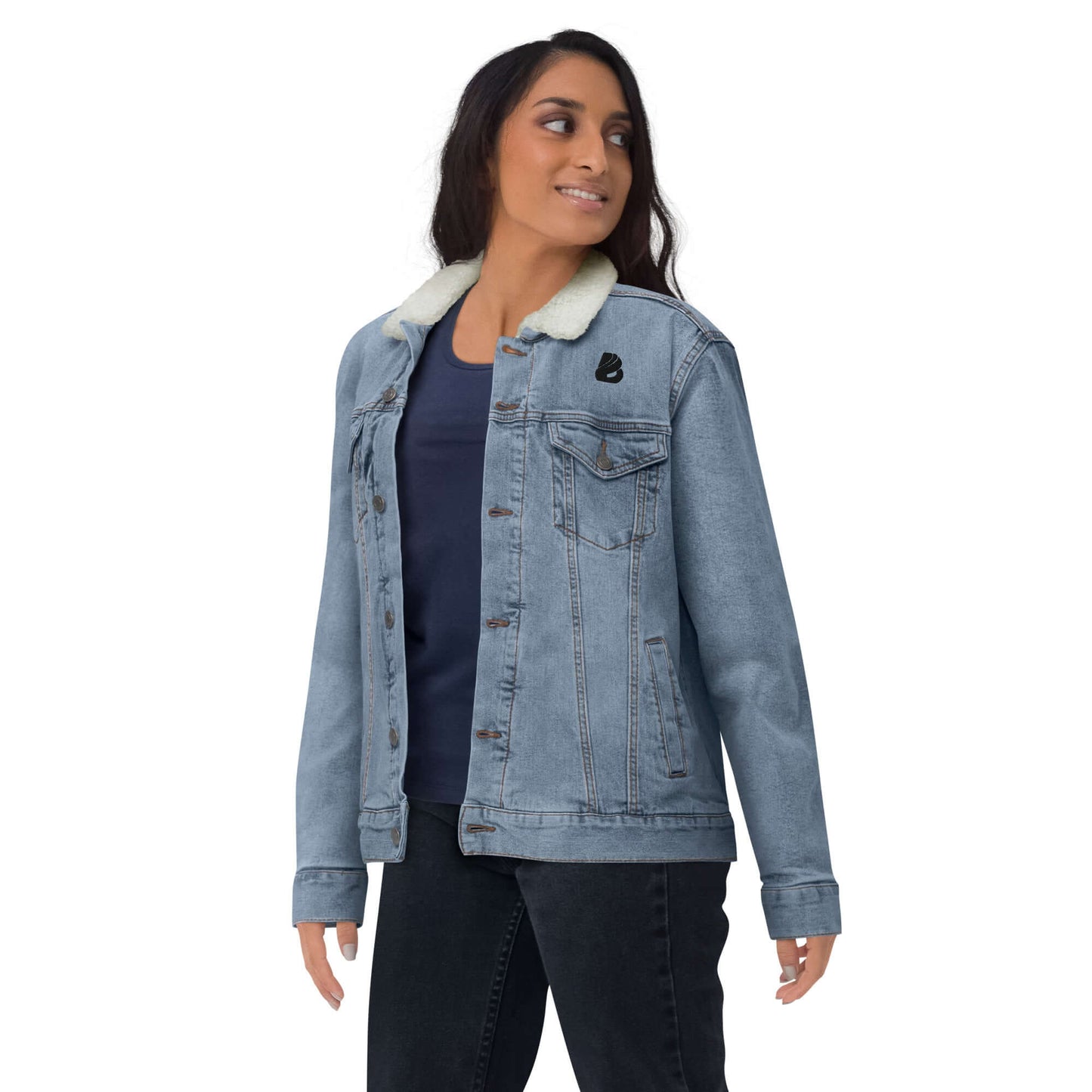 Model wearing Unisex Sherpa Jeansjacke N°2, a warm denim jacket with Sherpa lining for comfort and style in any season.