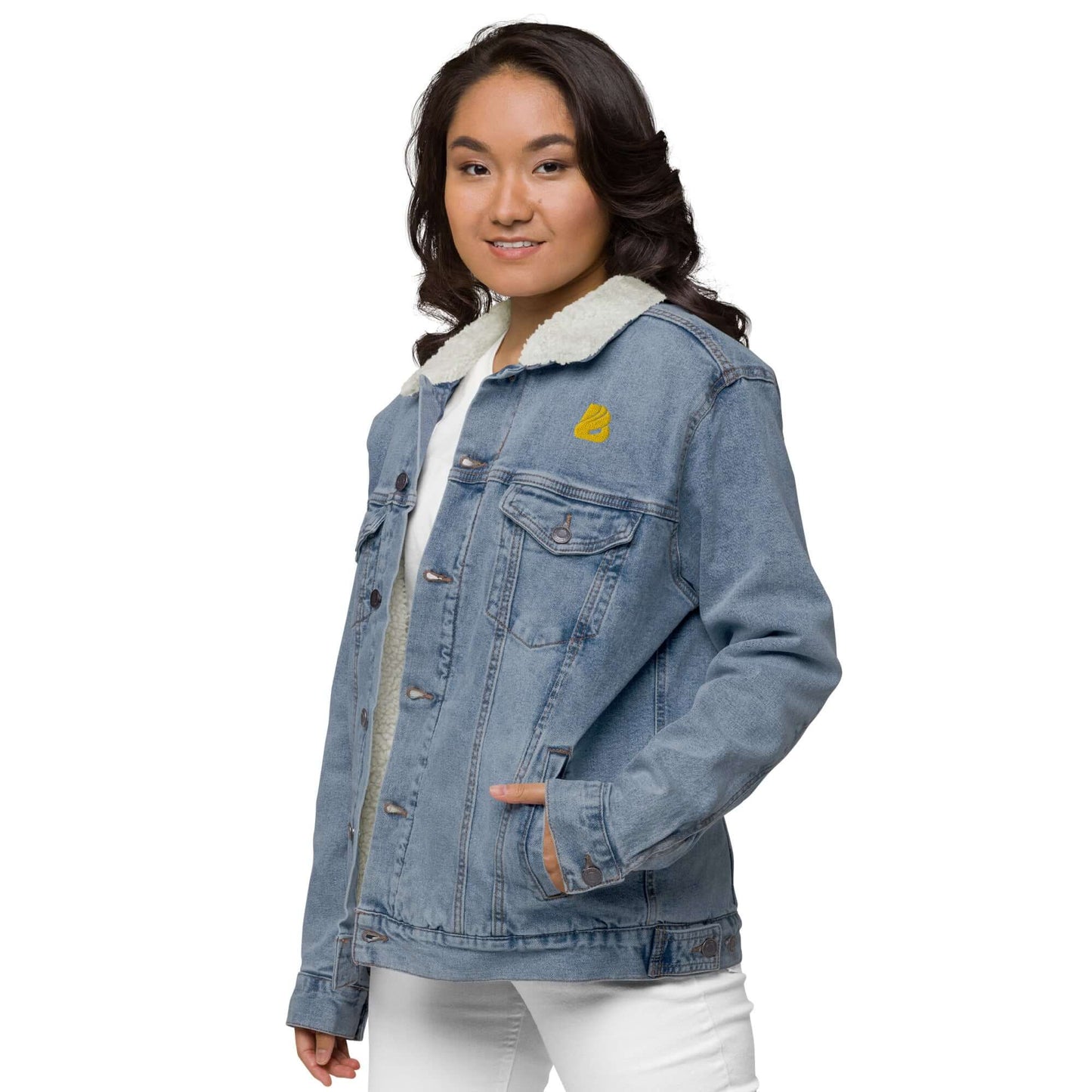 Woman wearing Unisex Sherpa Jeansjacke N°0, a stylish denim jacket with warm sherpa lining, made from recycled materials.