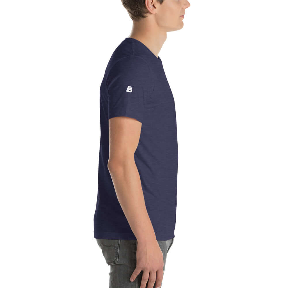 Side view of a model wearing a navy blue Unisex-T-Shirt N°0 made of soft, lightweight cotton with perfect elasticity and comfort.