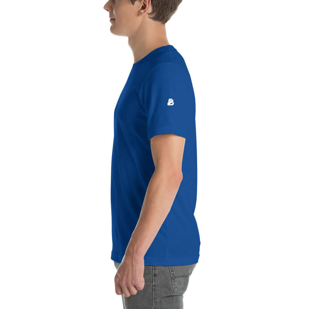 Side view of model wearing blue Unisex-T-Shirt N°0, showcasing soft, lightweight, elastic fabric with 100% cotton material.