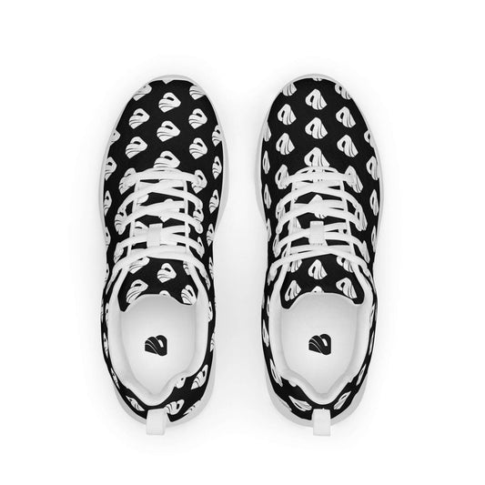 Top view of black and white Damen-Turnschuhe N°0 with heart pattern and lace-up design, featuring breathable lining and rubber outsole.