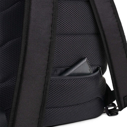 Close-up of Rucksack N°5 showing back mesh padding and hidden pocket with phone inside, ideal for secure storage.
