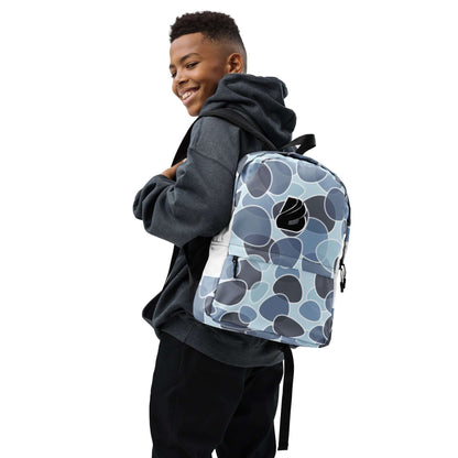 Boy wearing Rucksack N°5 with a modern design for daily use and sports, featuring laptop compartment and waterproof material.