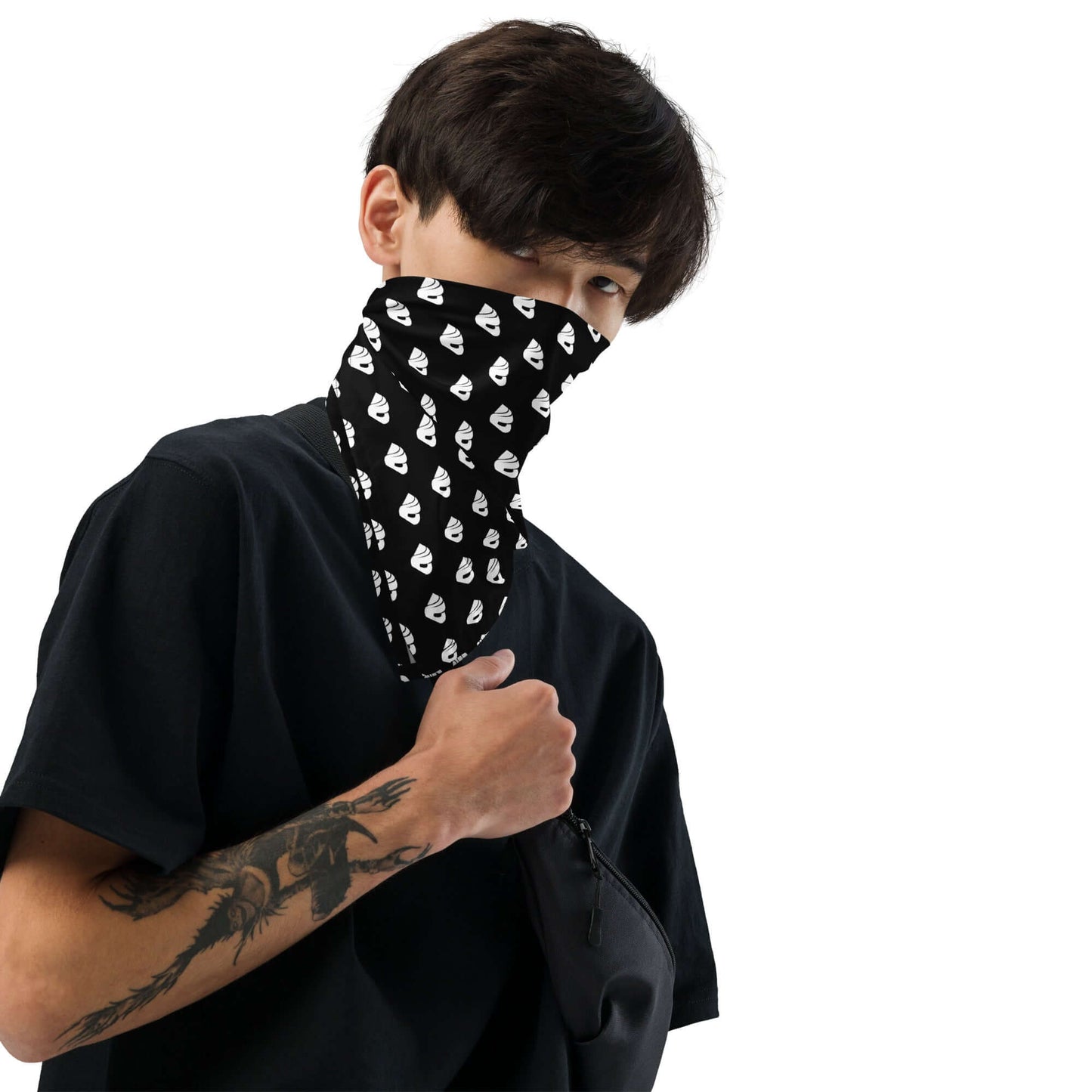 Person wearing a stylish black Bandana with allover print, featuring versatility as a headband, neck scarf, or bracelet.
